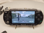Sony Psp 1001 system+ Game +Home Charger & Travel case+ Can do more