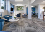 Modern resident lounge in The Indigo Apartments with stylish furniture and natural light.