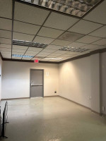 HEATED/ COOLED WAREHOUSE W DRIVE IN DOOR+OFFICE IN MIDTOWN FOR LEASE