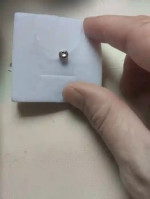 New gold pendant with a small natural diamond