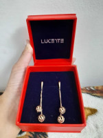 Golden earrings. The Lucente.