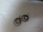 Coloured earrings and iridescent earrings