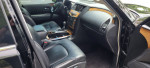 Interior view of a 2012 Infiniti QX56 with leather seats and advanced features