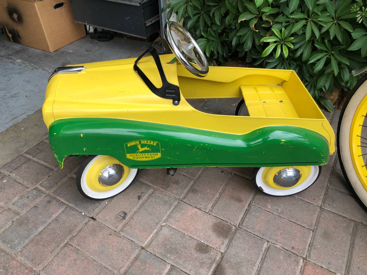 Gearbox John Deere pedal car (315) and a 20” nirve John Deere bike ($1