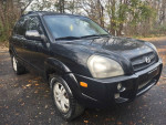 2006 Hyundai Tucson Limited FWD in black, showcasing alloy wheels and clean body, ready for sale with new brakes.