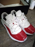White and red Jordan low top 11s Men size 9 1/2