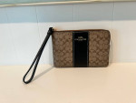 Coach Corner Zip Wristlet In Signature Canvas