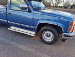 1991 Chevy Silverado C1500 pickup truck with blue exterior, clean interior, and 8-foot bed parked on asphalt.