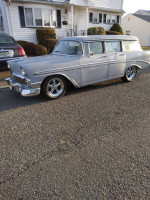 1956 Chevrolet Belair Beauville 9 passenger wagon, rare classic car in great condition, parked on the street.