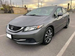 Gray Honda Civic with reverse camera, parking sensors, and low mileage for sale at $6,500.
