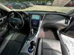 Interior view of a black 2017 Infiniti Q50 sedan showing the dashboard and seats