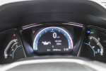 Dashboard view of a 2018 Honda Civic EX showing mileage and oil life indicators.