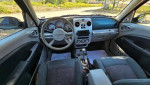 Interior view of a 2006 Chrysler PT Cruiser with gray seats and modern dashboard features
