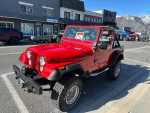 1976 Jeep CJ7 in excellent condition, red color, ready for off-road adventures with a 4-inch lift.
