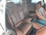 Interior view of a 2014 BMW 6 Series 640i convertible with brown leather seats