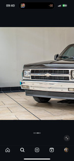 Front view of a 1992 Chevrolet S-10 Tahoe truck with shiny chrome features.