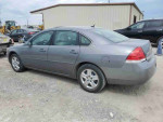 2006 Chevrolet Impala LS in gray with 170,000 miles, clean and reliable, ideal for daily commuting.