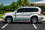 2007 Lexus GX 470 in Blizzard Pearl with leather interior and 17-inch wheels parked outdoors