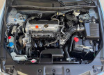 Engine compartment of a 2012 Honda Accord LX with 52700 miles, featuring a 2.4L gasoline engine.
