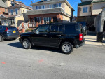 2015 Jeep Patriot Sport in excellent condition, parked on a residential street.