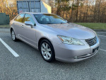 Well maintained 2009 Lexus ES350 with clean exterior and leather interior, parked in a lot.
