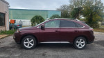 2015 Lexus RX 350 luxury SUV in burgundy color parked outdoors with low mileage and pristine condition.