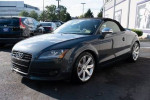 2009 Audi TT 3.2L Roadster in Aruba Blue Pearl with black roof, showcasing luxury and performance.