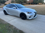 2017 Lexus IS200t in excellent condition, silver exterior, parked on driveway with black wheels.