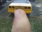 1989 yellow Corvette convertible, excellent condition, for sale with new battery and tires, caught in snow.