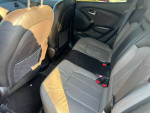 Rear interior of a 2011 Hyundai Tucson with leather seats and spacious passenger area