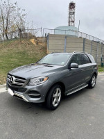 2018 Mercedes-Benz GLE-Class GLE 350 4MATIC SUV parked on a street, showcasing its sleek design and features.