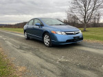 2008 Honda Civic LX FWD in excellent condition, 102,000 miles, parked on a gravel road.
