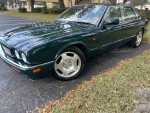 1996 Jaguar XJR in beautiful condition, showcasing its sleek design and supercharged engine.