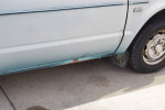 Side view of a 1978 Honda Civic showing surface rust and missing rear bumper end.