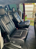 Interior view of 2014 Chrysler Town & Country showing black leather seats for a comfortable ride.