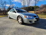 2005 Dodge Stratus SXT FWD in Satin Jade Pearl with 146,000 miles, gently used and well maintained.