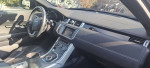 Interior view of a 2013 Land Rover Range Rover Evoque with leather seats and modern dashboard.