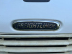 Freightliner logo on a 2004 mechanic special truck for parts sale, cracked frame, 150K miles.