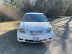 2010 Honda Odyssey EX FWD in excellent condition, low mileage with two sets of tires included.