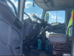 Interior view of a 2007 Hino 268 truck, featuring an automatic transmission and spacious seating.