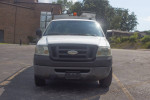 2008 Ford F150 commercial truck with a cap, perfect for contractors, painters, and small business use.