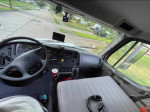Interior view of a 2009 Freightliner 26' box truck with spacious dashboard and controls.