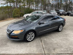 2012 Volkswagen CC R-Line in gray with leather seats, parked outdoors, showing alloy wheels and detailed exterior