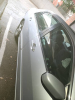 2005 Honda Accord with damage to rear, not drivable, good for parts, in parking space