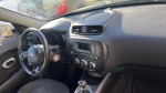 Interior view of a 2014 Kia Soul showcasing the dashboard and steering wheel