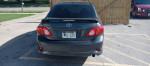 Rear view of a 2009 Toyota Corolla S for sale, has an electric issue, well maintained, clean title included.