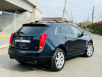 2015 Cadillac SRX Premium FWD in excellent condition with 92,000 miles, showcasing modern features and elegant design.