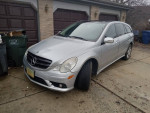 2010 Mercedes-Benz R 350 4MATIC in Iridium Silver parked outside, showcasing its elegant design.