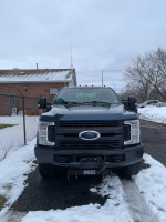 2019 Ford F-250 Superduty truck for sale, front view, located in snowy environment, no back seat, 69,616 miles