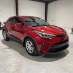 2020 Toyota C-HR LE Sport Utility in red, showcasing modern design and clean title with low mileage.